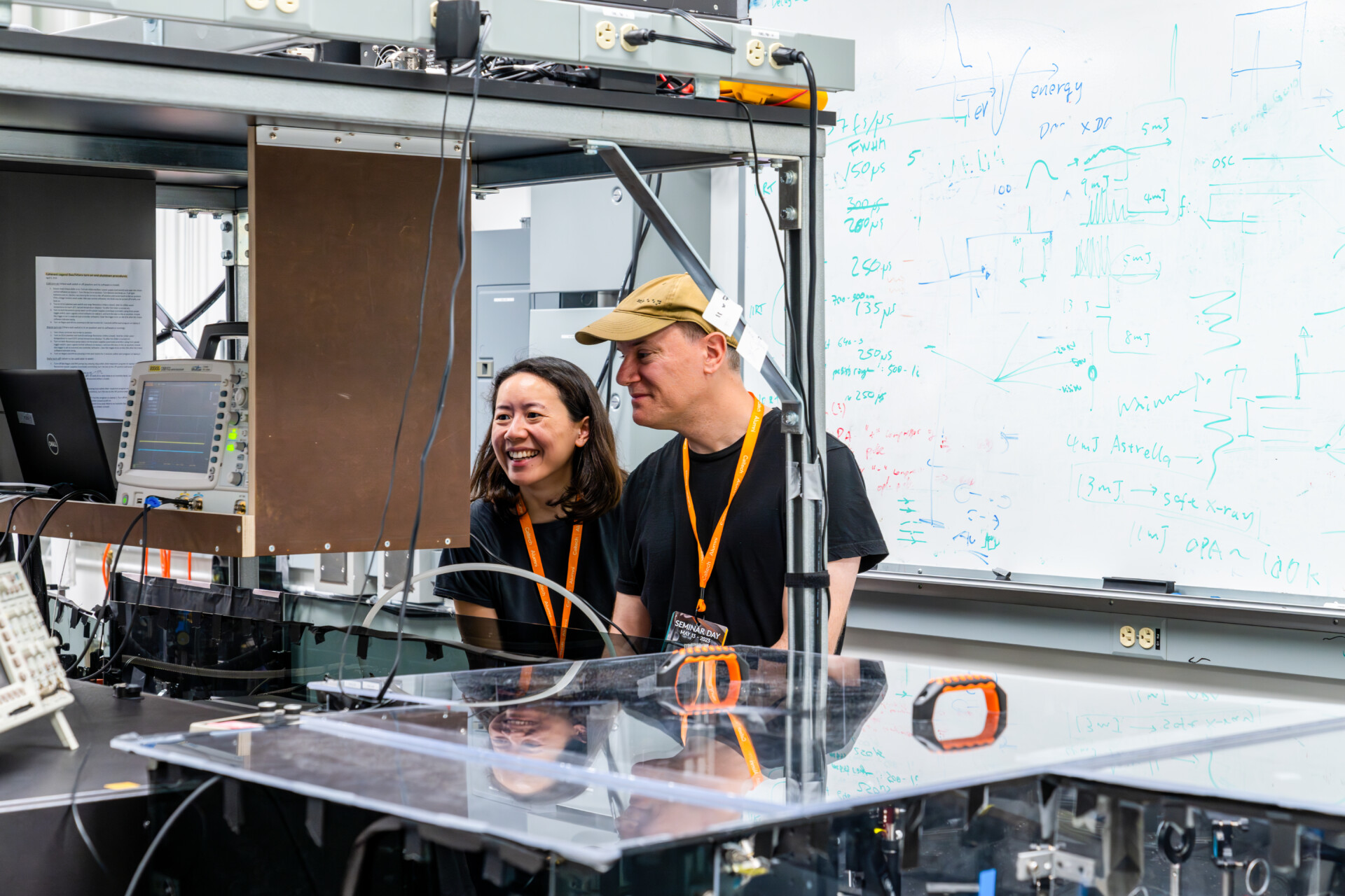 Alumni smiling during lab tour.